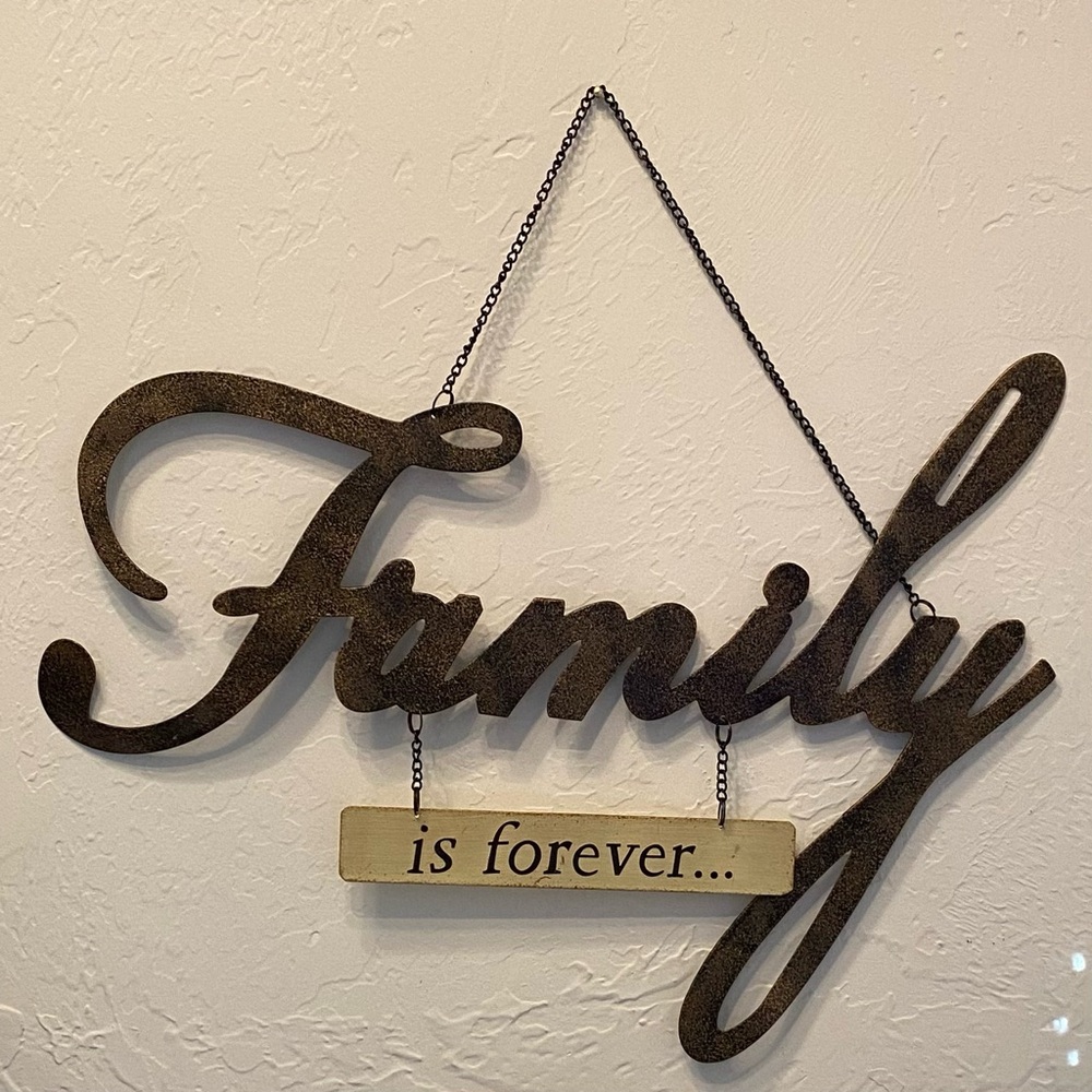 Metal “family is forever” wall hanging